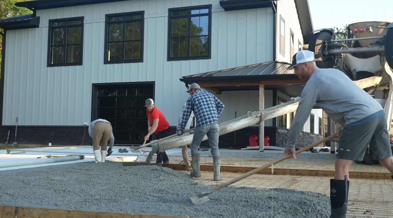 Concrete contractor team pouring residential foundation near Hollister, CA